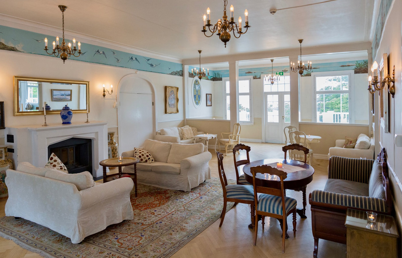 The historic fireplace lounge at Hotel Langesund Bad